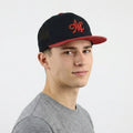 Mania & Co. Embroidered Snapback Trucker Hat - Black/Red Mesh Cap