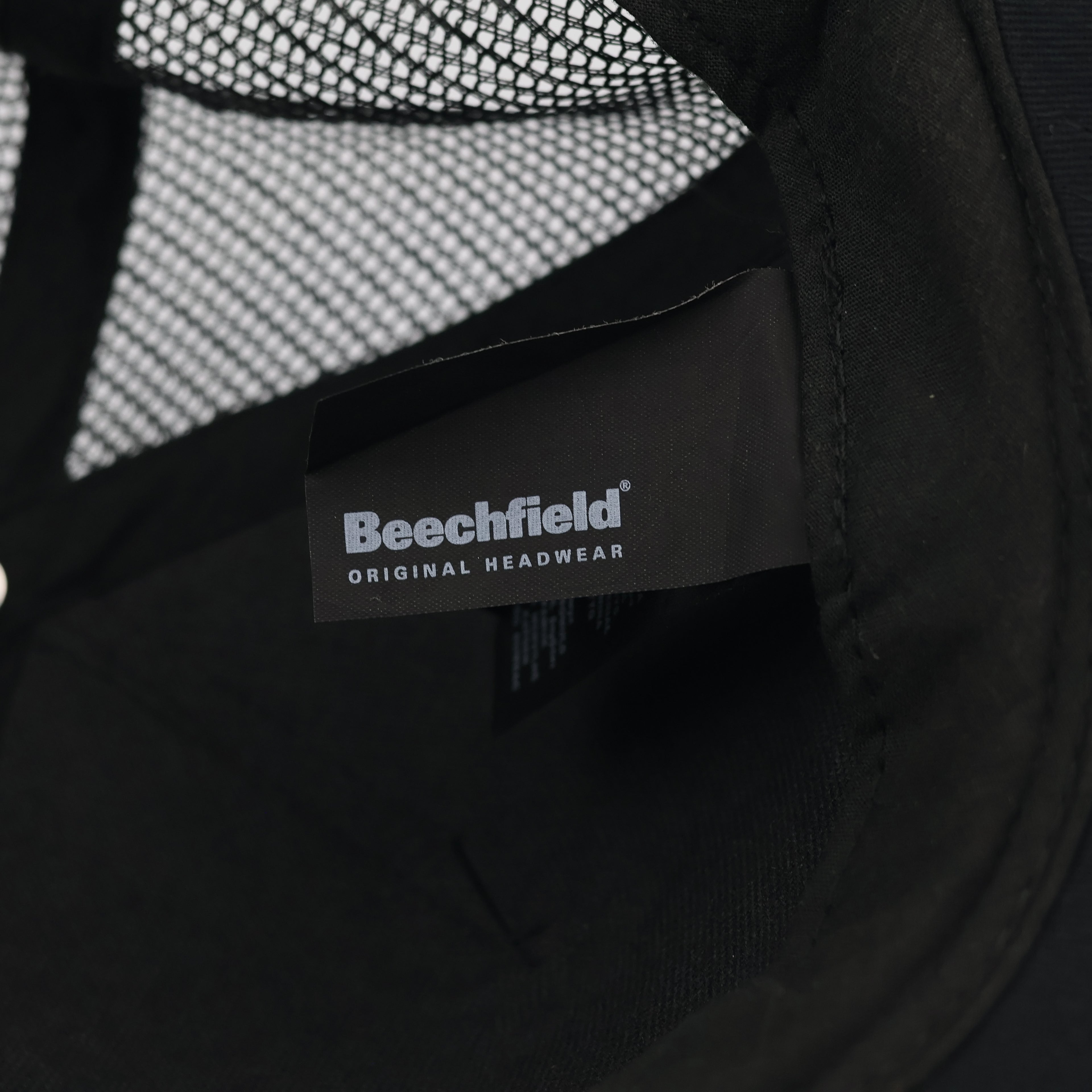 Beechfield Hitachi Colore la Vie Black Trucker Hat