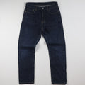 Thrifted Uniqlo Men's Dark Indigo Blue Jeans 30 Waist/ J1014