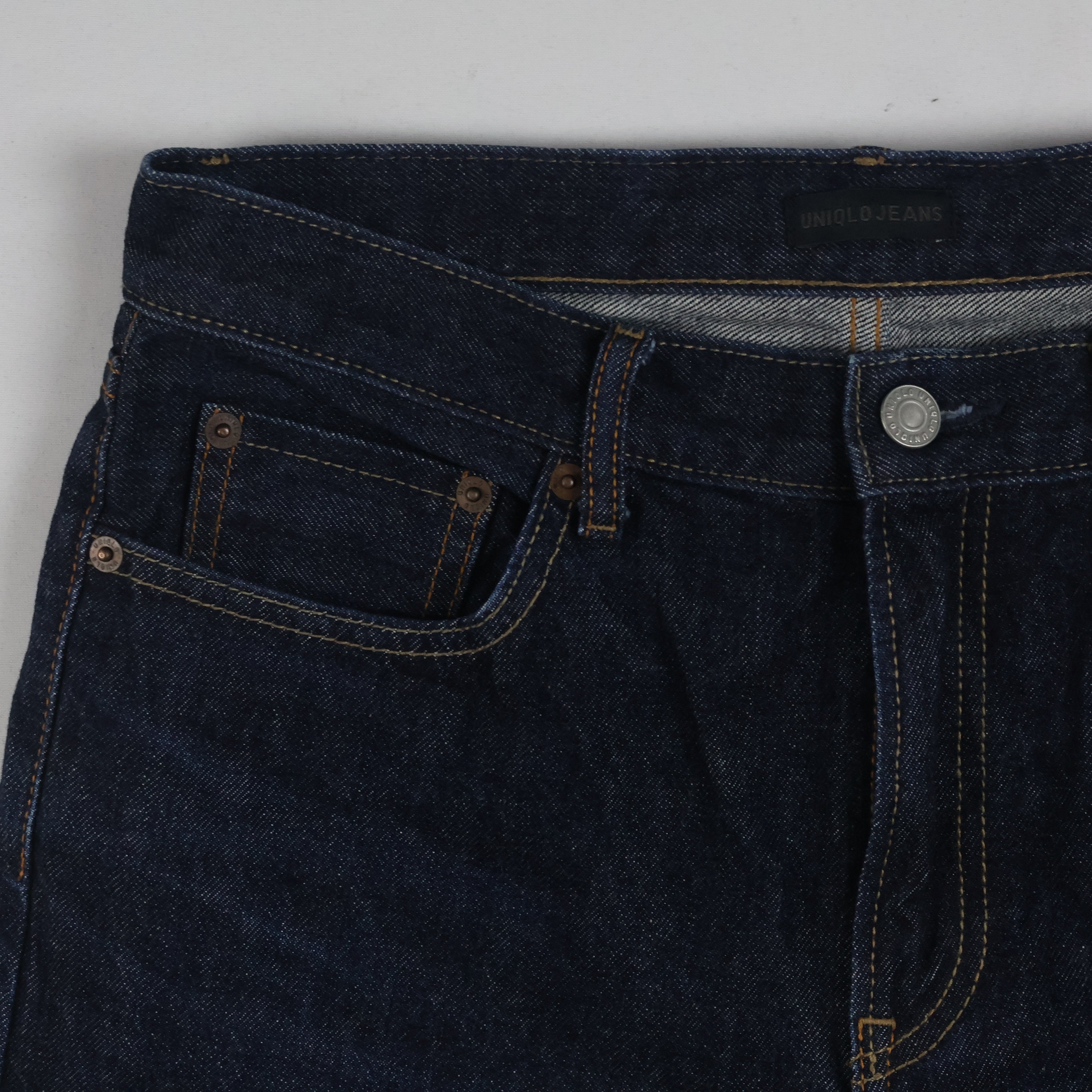 Thrifted Uniqlo Men's Dark Indigo Blue Jeans 30 Waist/ J1014