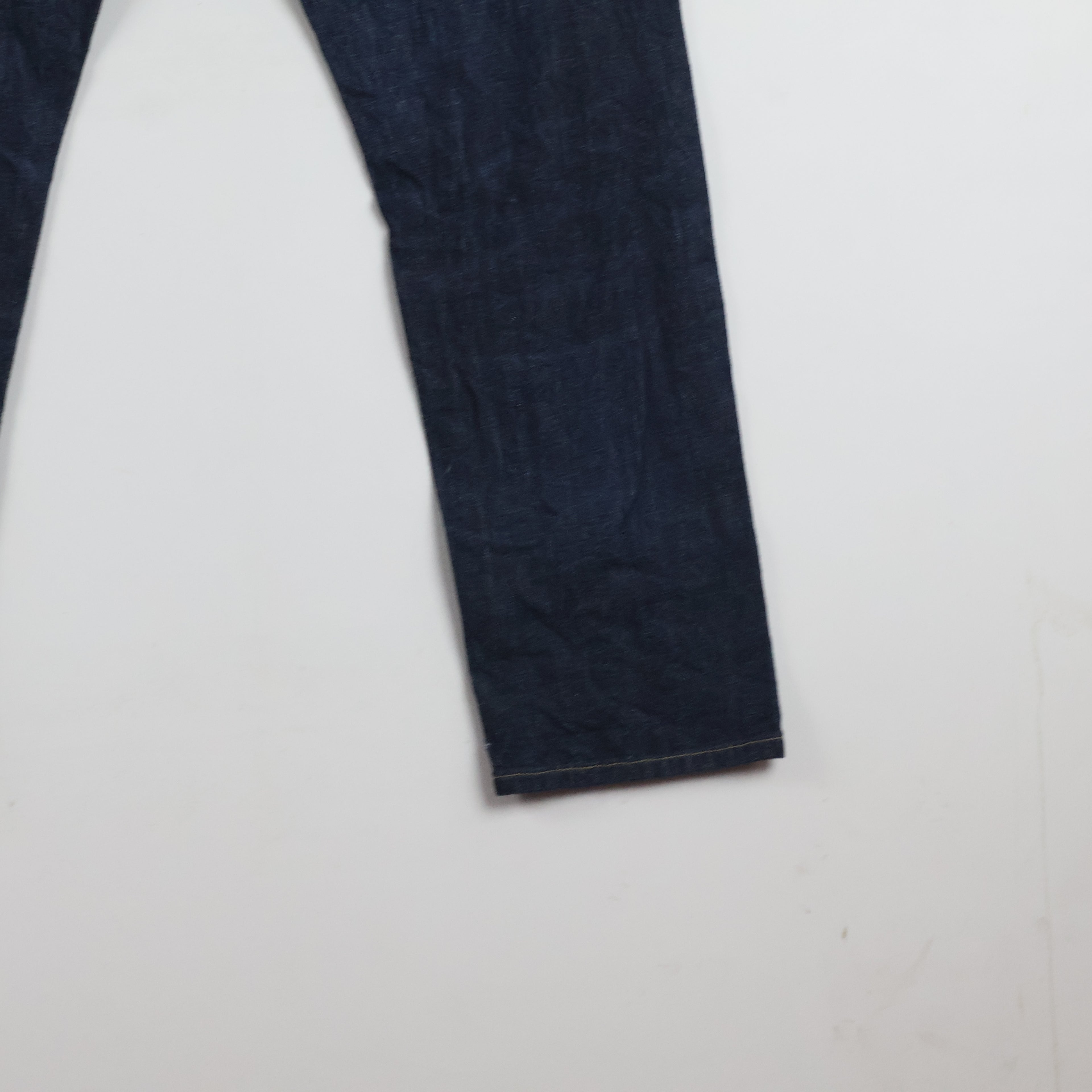 Thrifted Uniqlo Men's Dark Indigo Blue Jeans 30 Waist/ J1014