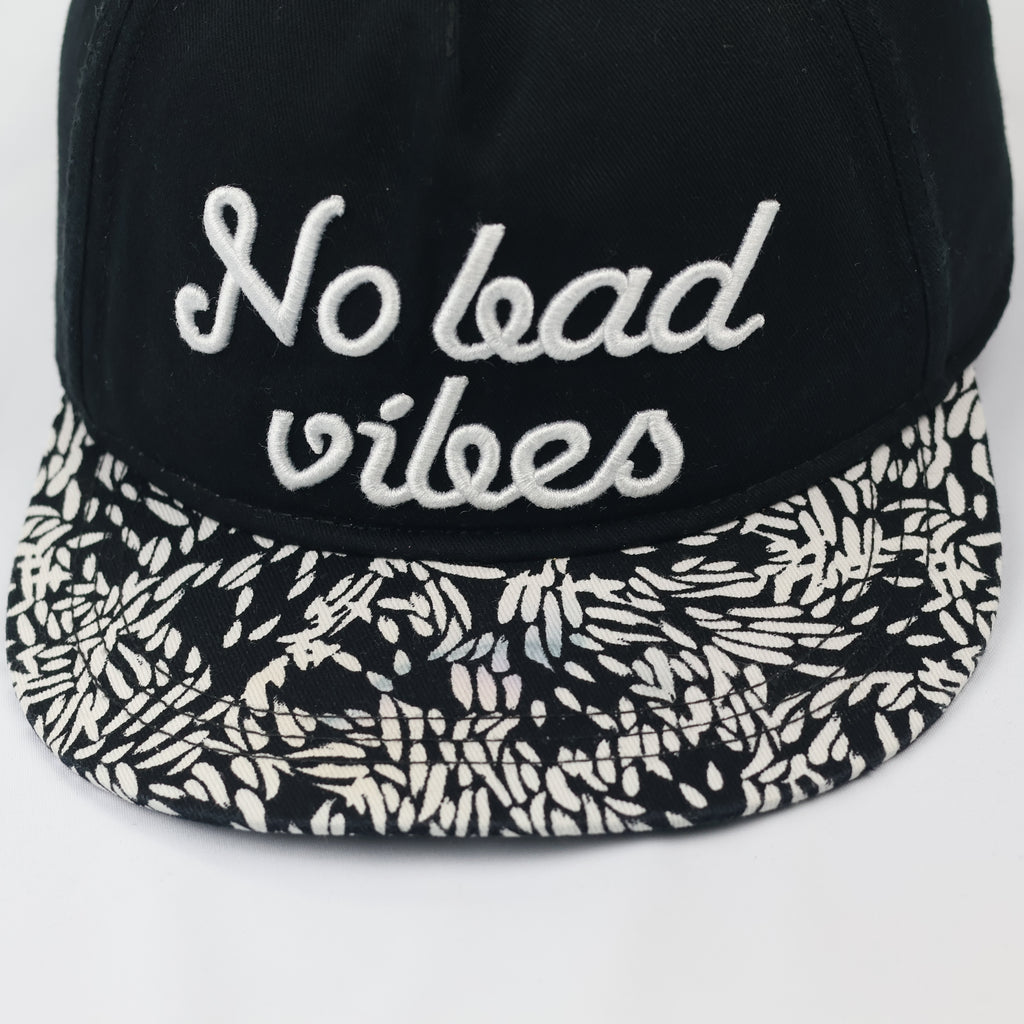 H&M "No Bad Vibes" Slogan Snapback Cap - Black & Floral