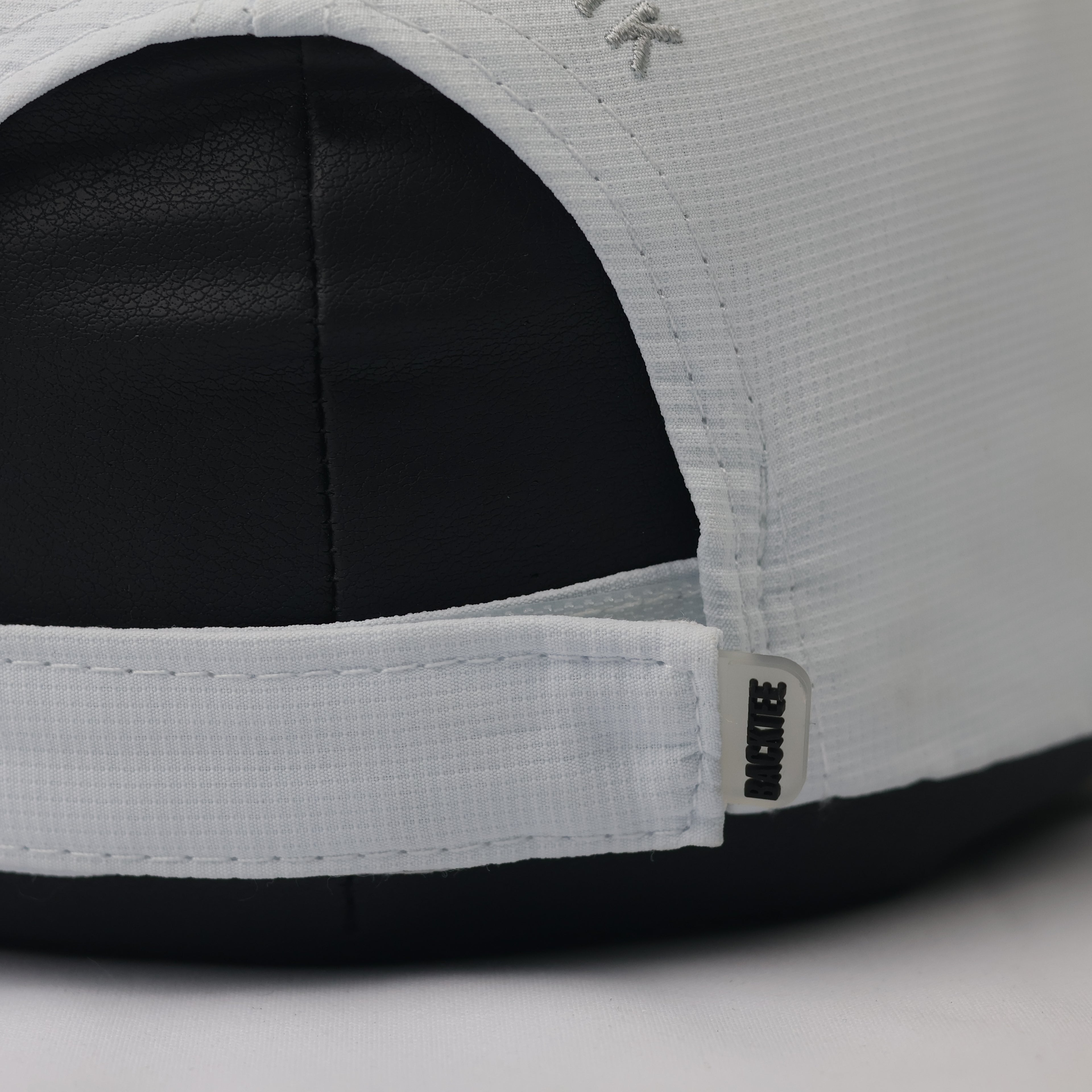 Backtee x Jyske Bank Technical White Performance Golf Thrifted Cap