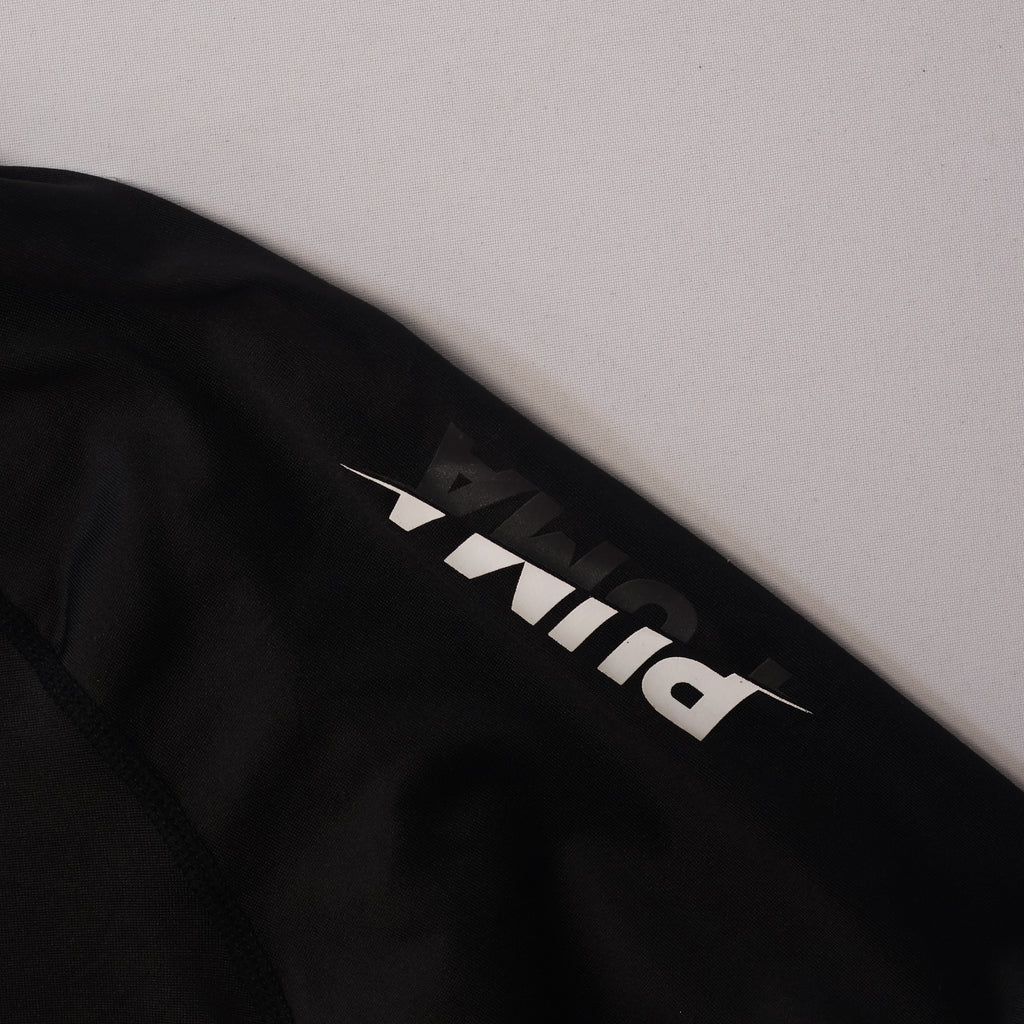 PUMA Athletic Long Sleeve Thrifted Tee | Moisture Wicking