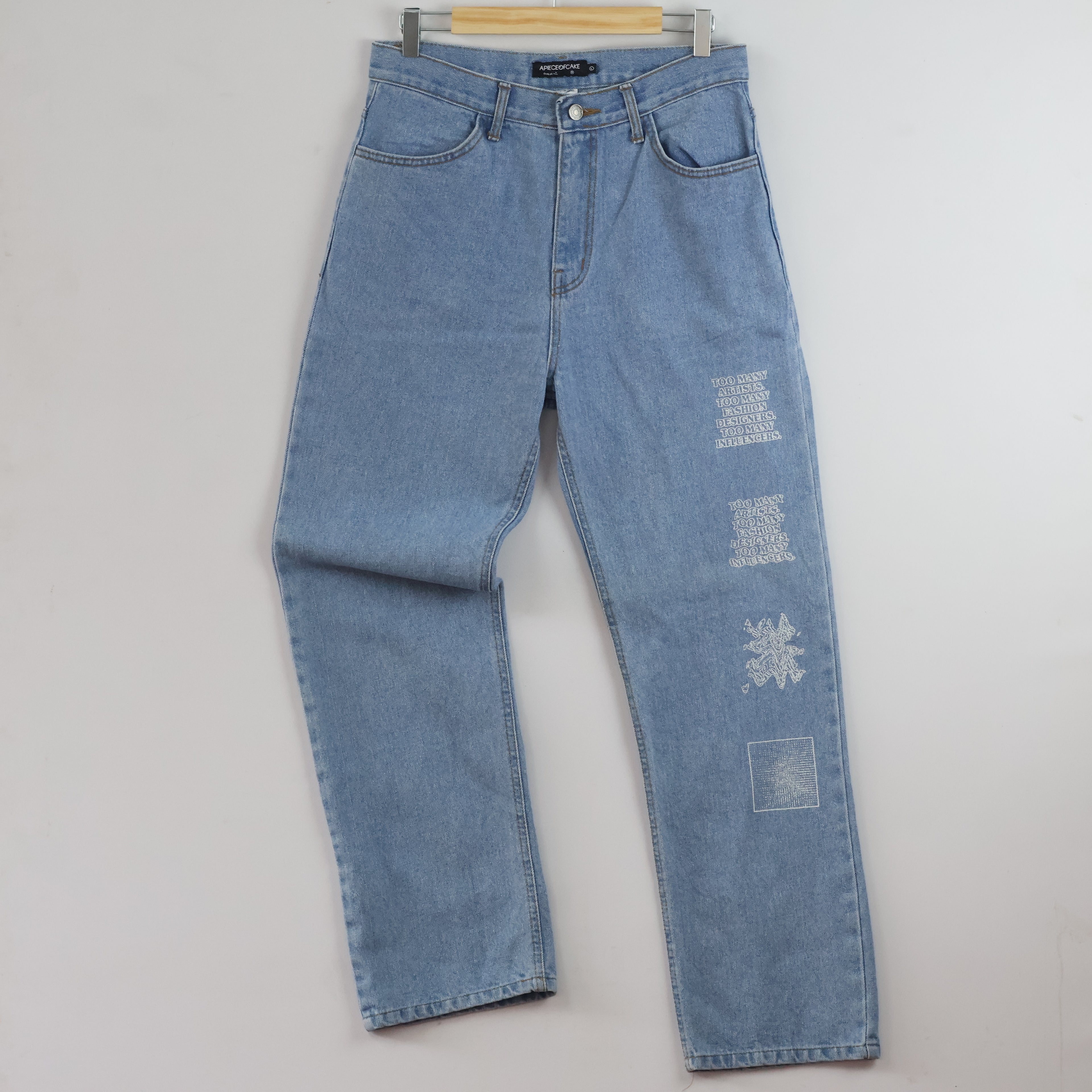 Thrifted Vintage APIECEOFCAKE Light Blue Graphic Denim Jeans waist 30/ J1056