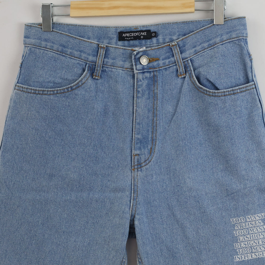Thrifted Vintage APIECEOFCAKE Light Blue Graphic Denim Jeans waist 30/ J1056