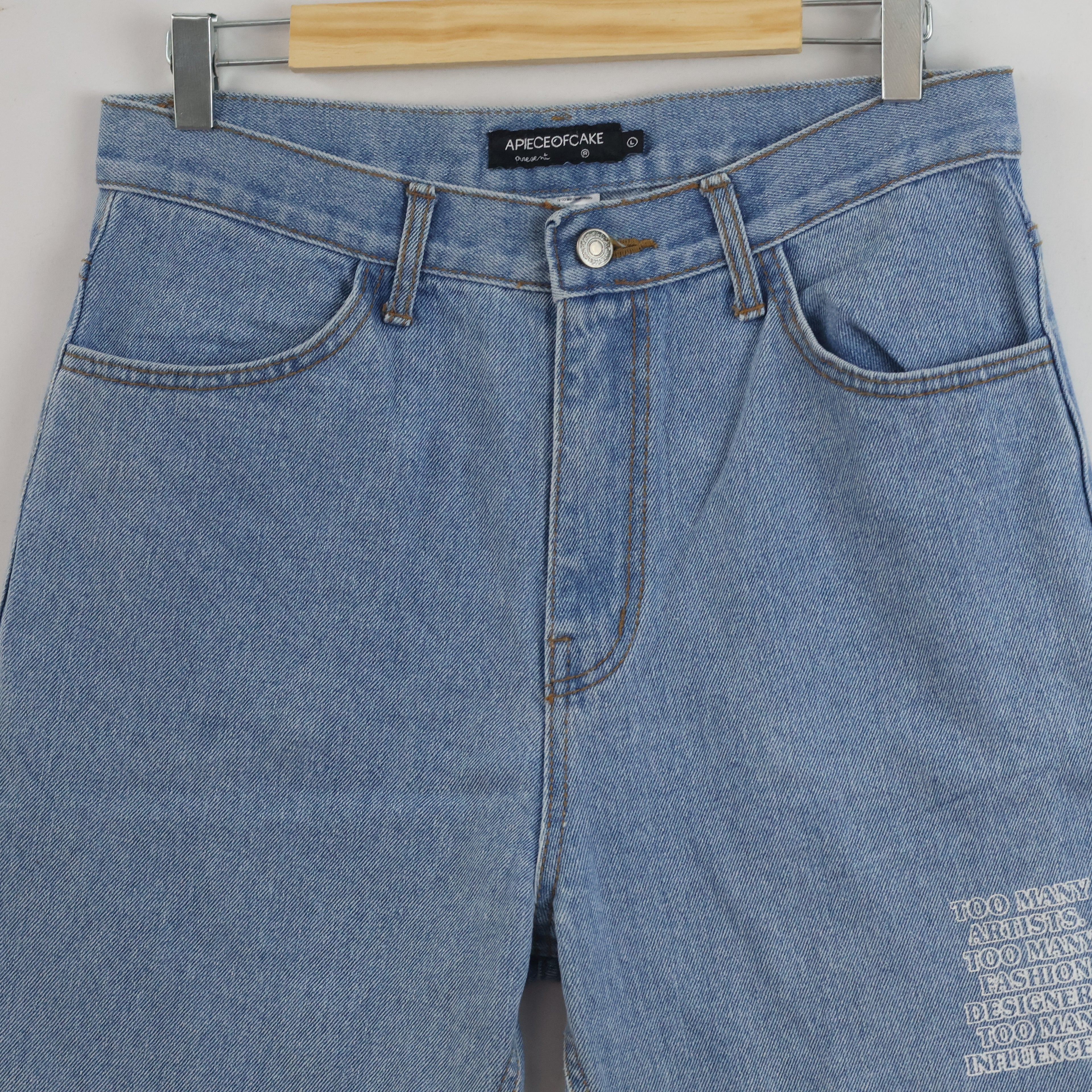 Thrifted Vintage APIECEOFCAKE Light Blue Graphic Denim Jeans waist 30/ J1056