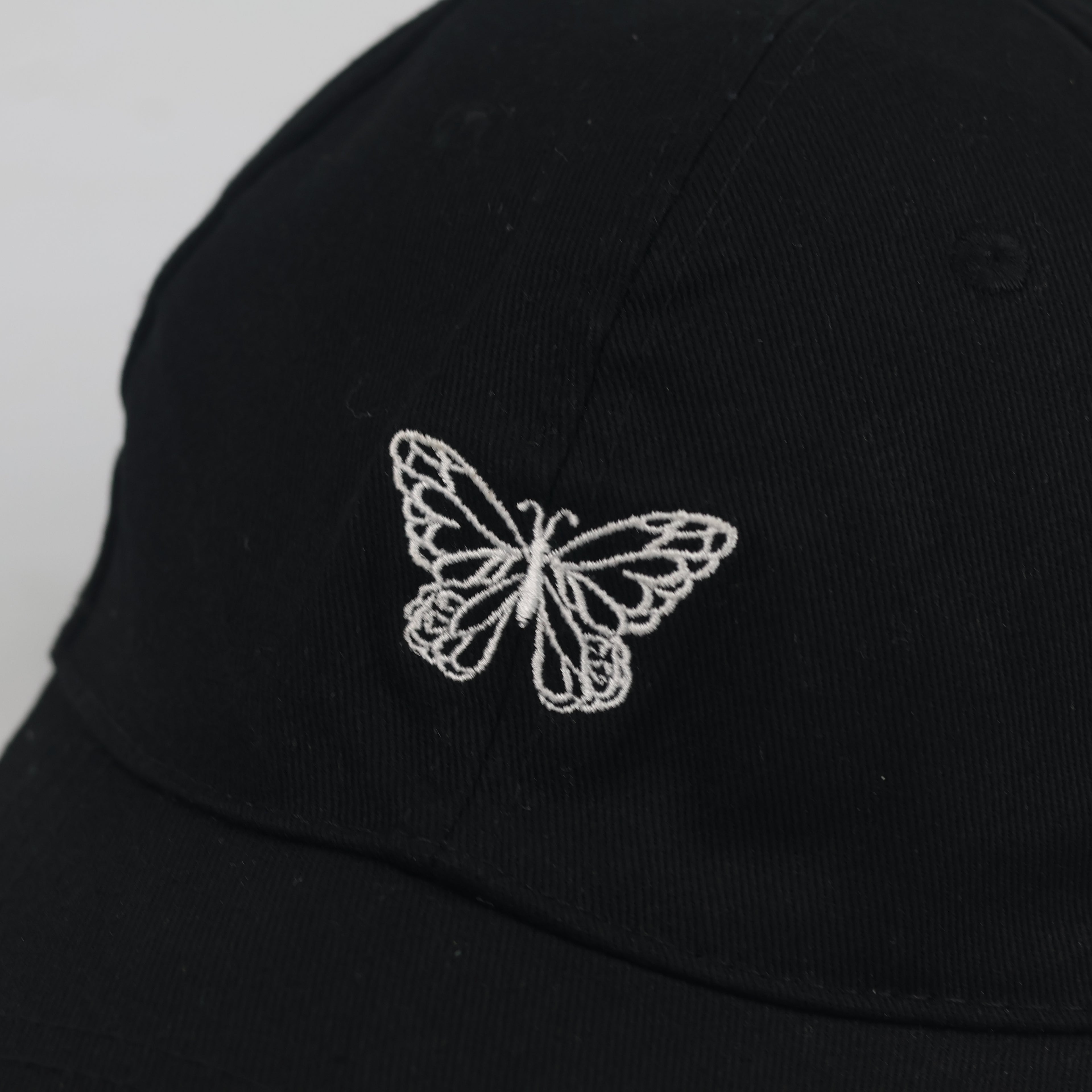 Thrifted Sinsay White Butterfly Outline Black Strapback Cap - Size 56-58cm