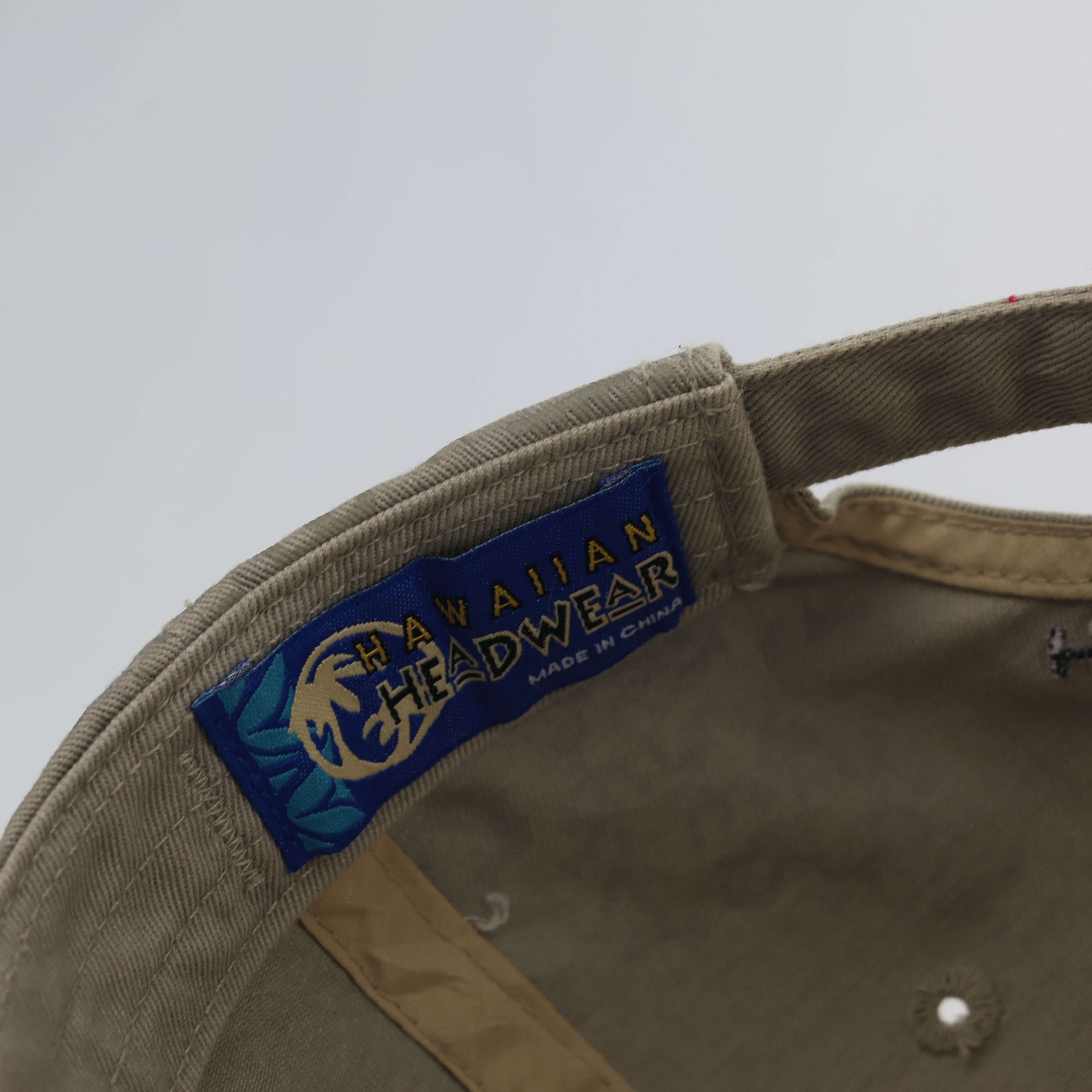 Hawaiian Headwear Khaki Thrifted Cap with Tribal Petroglyph Print & Flag Detail