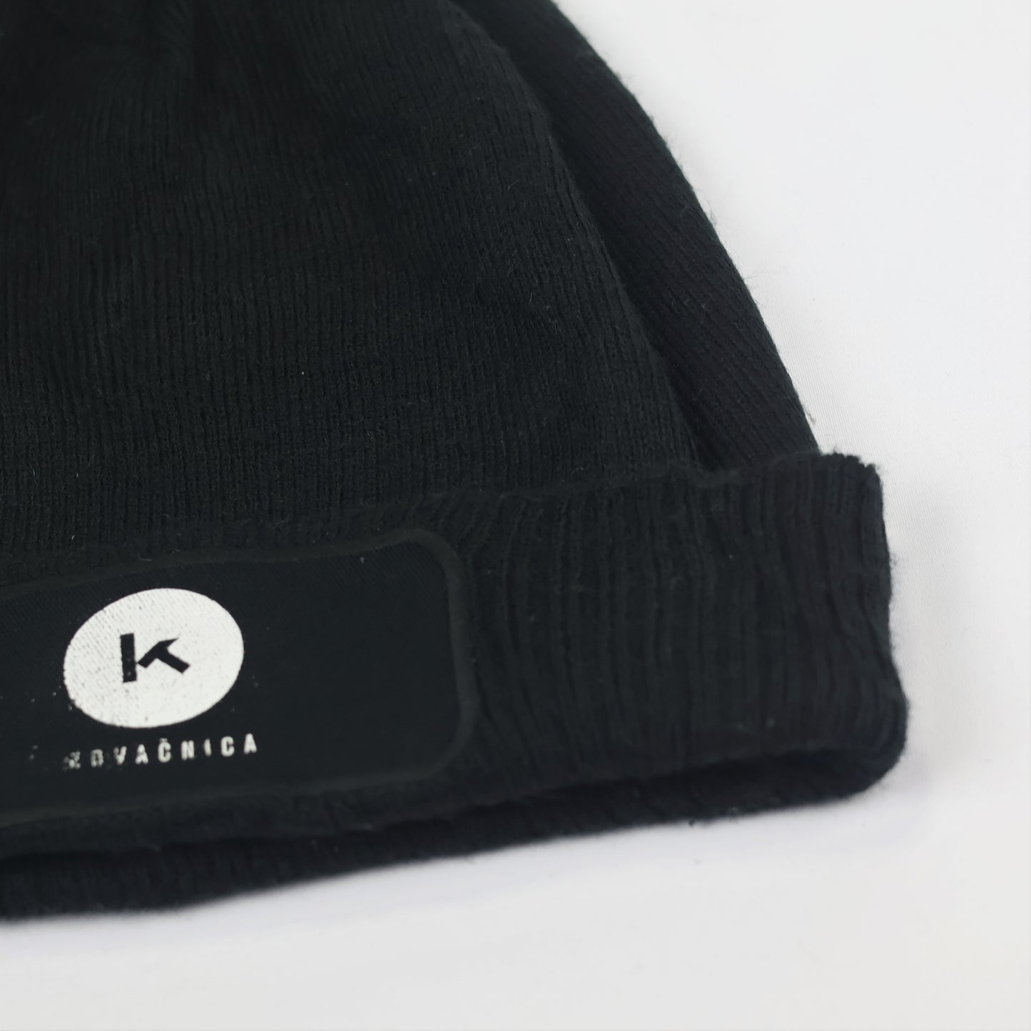 Beechfield Black Knit Beanie with Pom Pom & Kovačnica Logo Patch