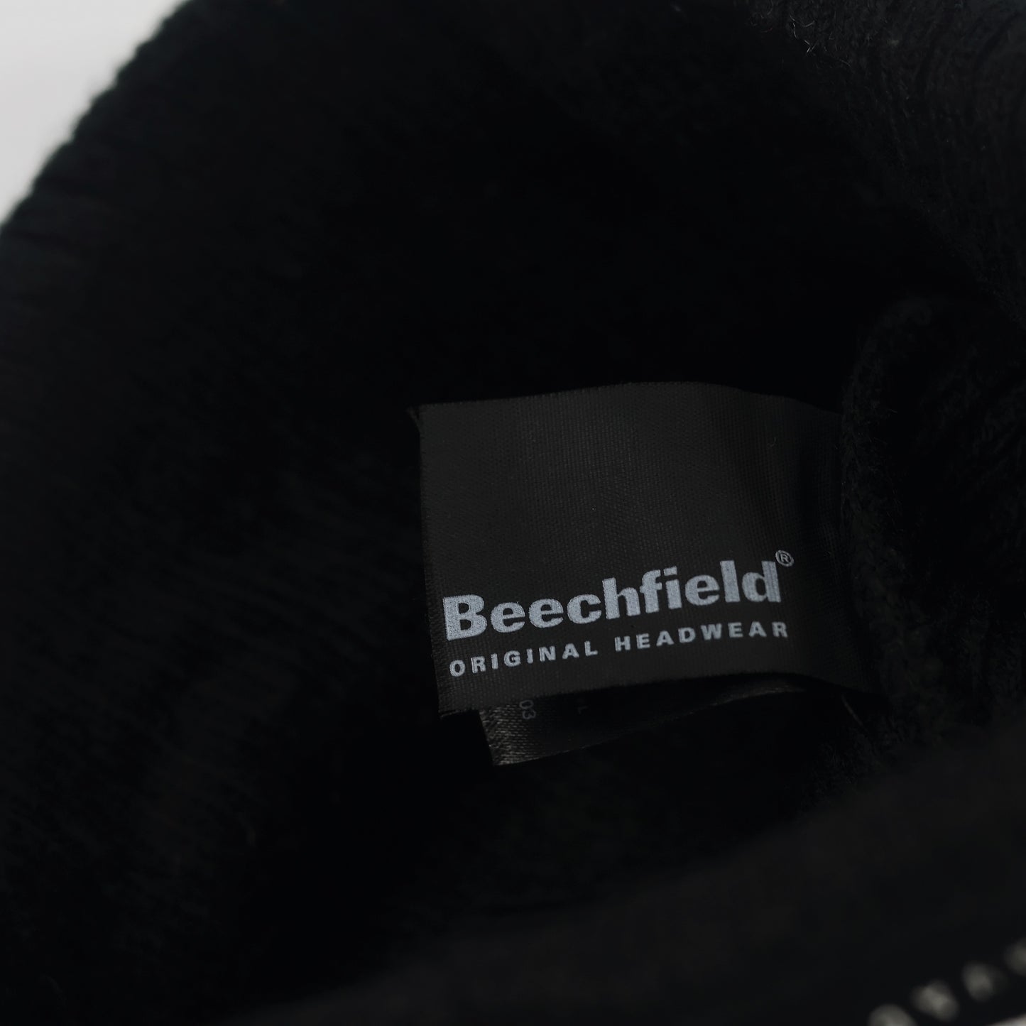 Beechfield Black Knit Beanie with Pom Pom & Kovačnica Logo Patch