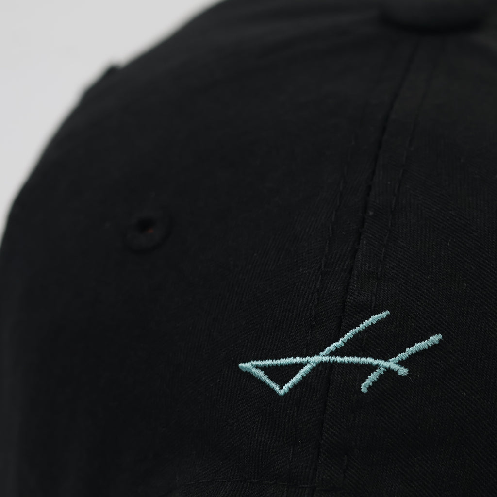 Minimalist Black Thrifted Dad Hat with Teal Cursive Embroidery