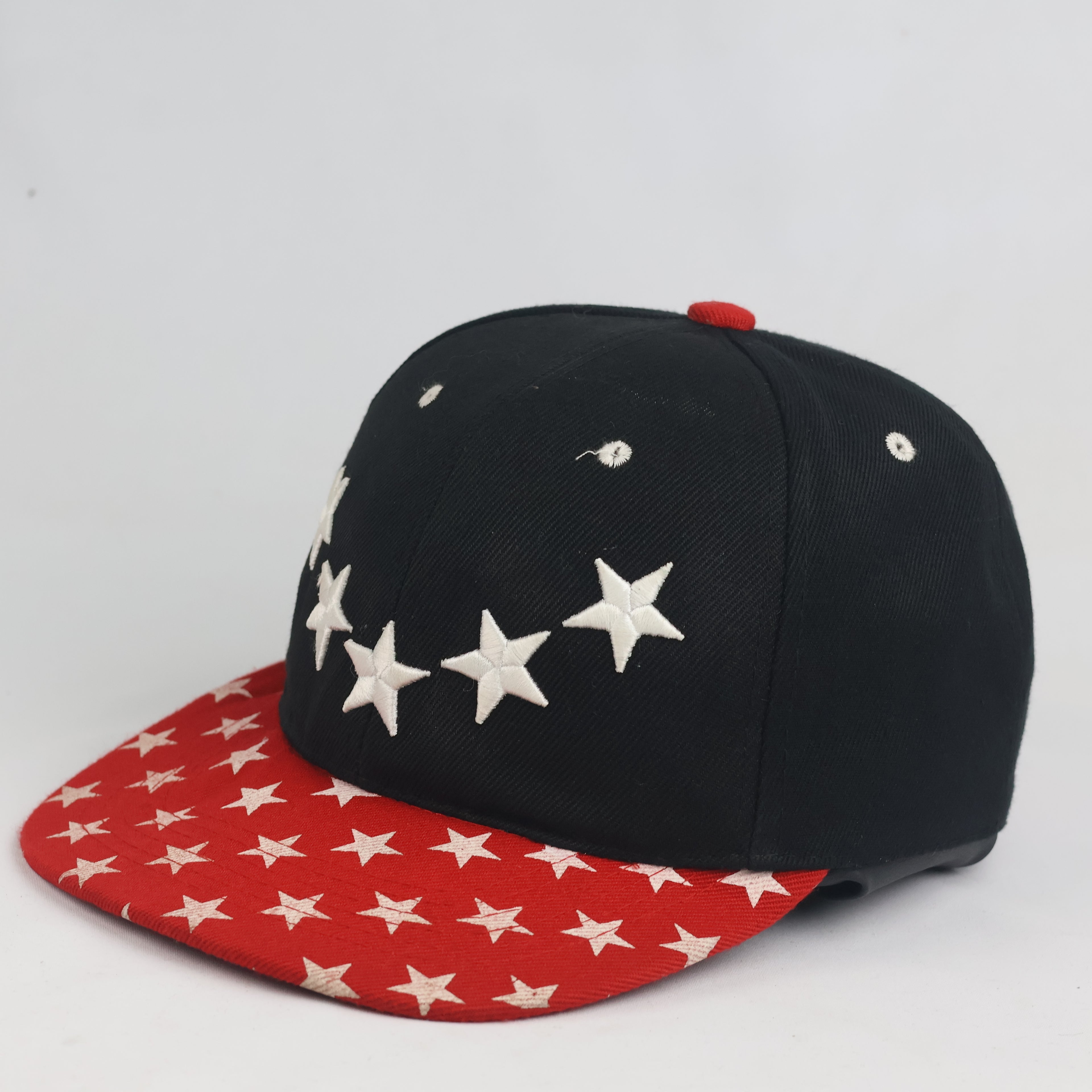 Streetwear Embroidered Star Snapback Cap - Black Crown with All-Over Printed Red Visor
