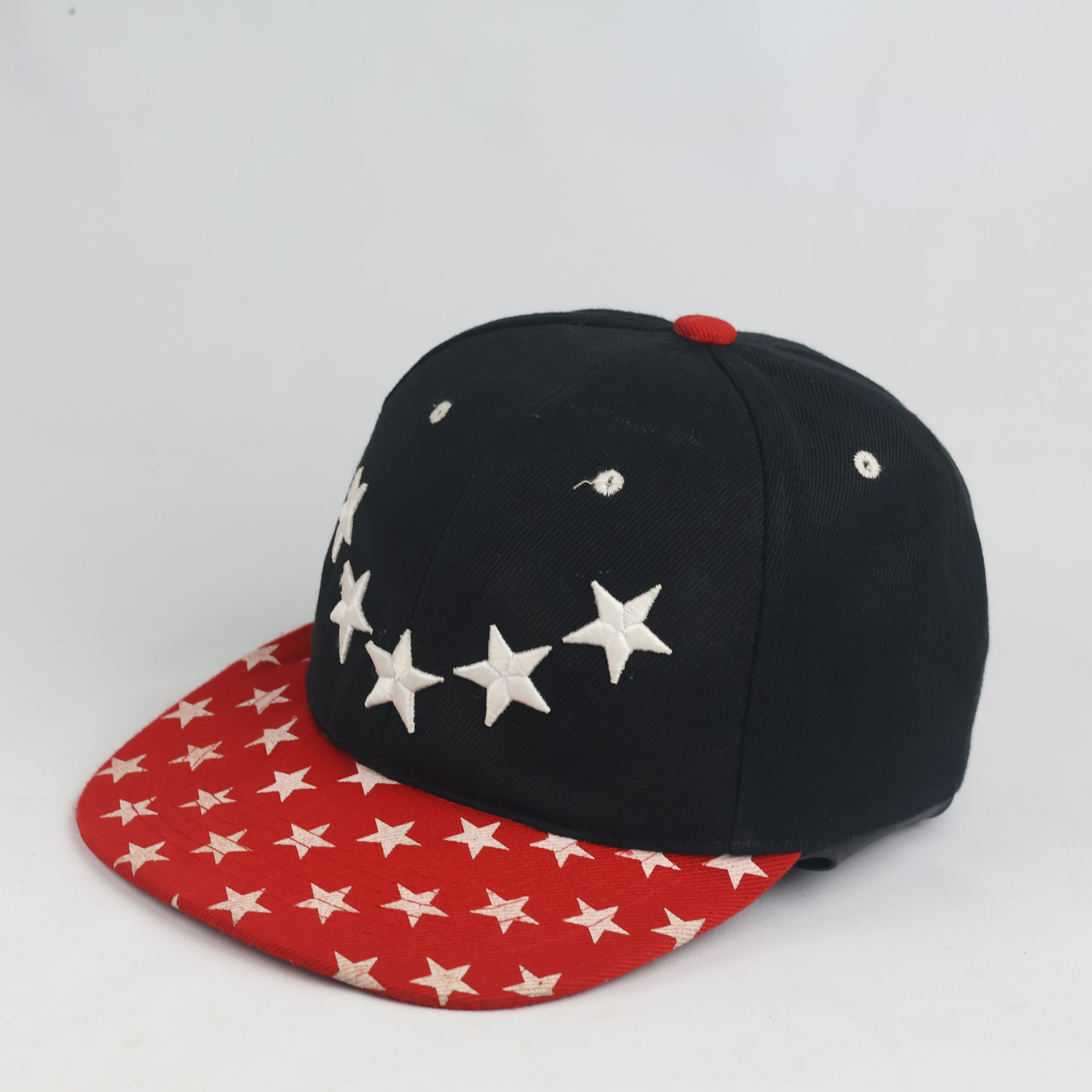 Streetwear Embroidered Star Snapback Cap - Black Crown with All-Over Printed Red Visor
