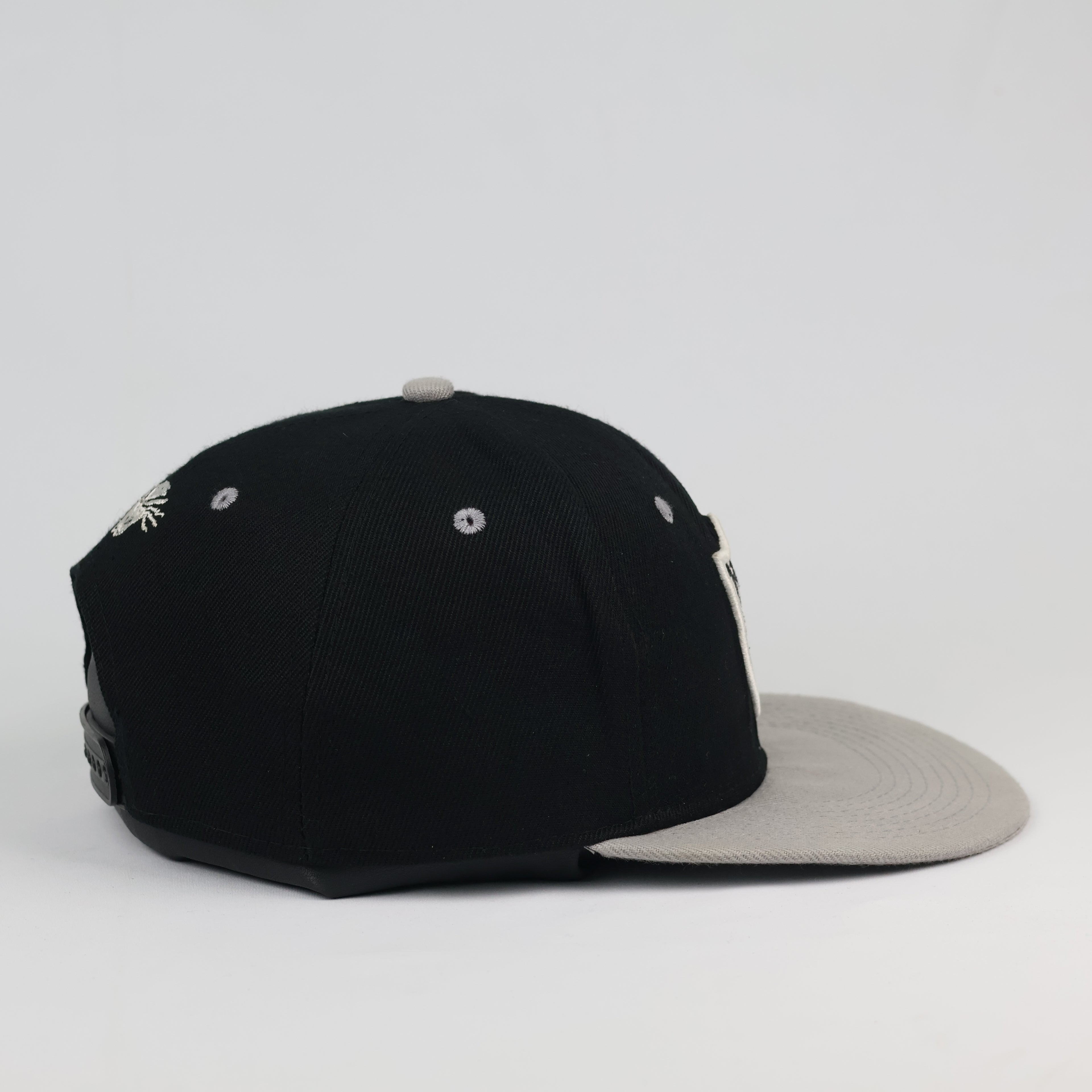 Vintage Raiders Snapback Hat | Black & Grey Two-Tone Sportswear Cap