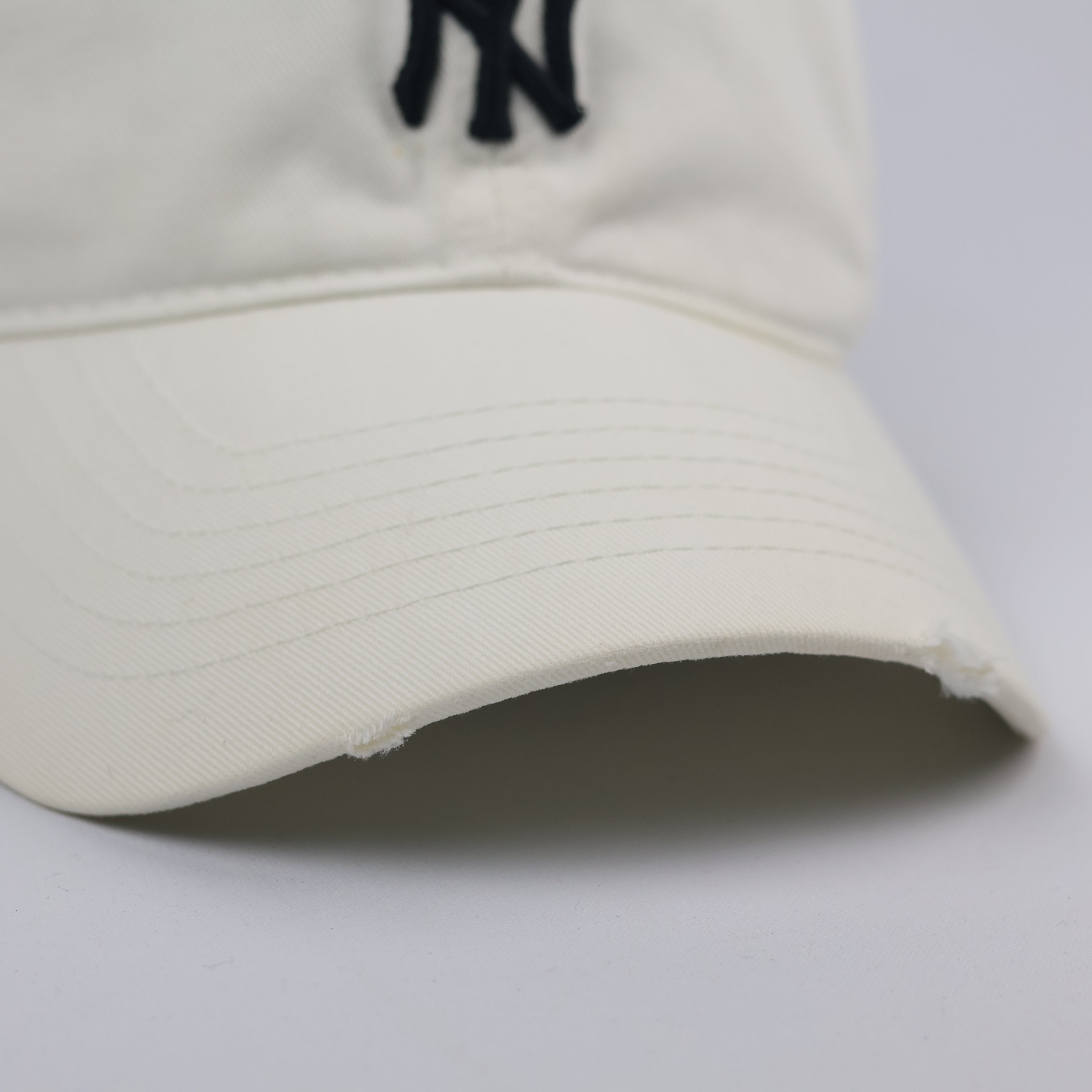 Vintage MLB New York Yankees Off-White Distressed Dad Thrifted Hat