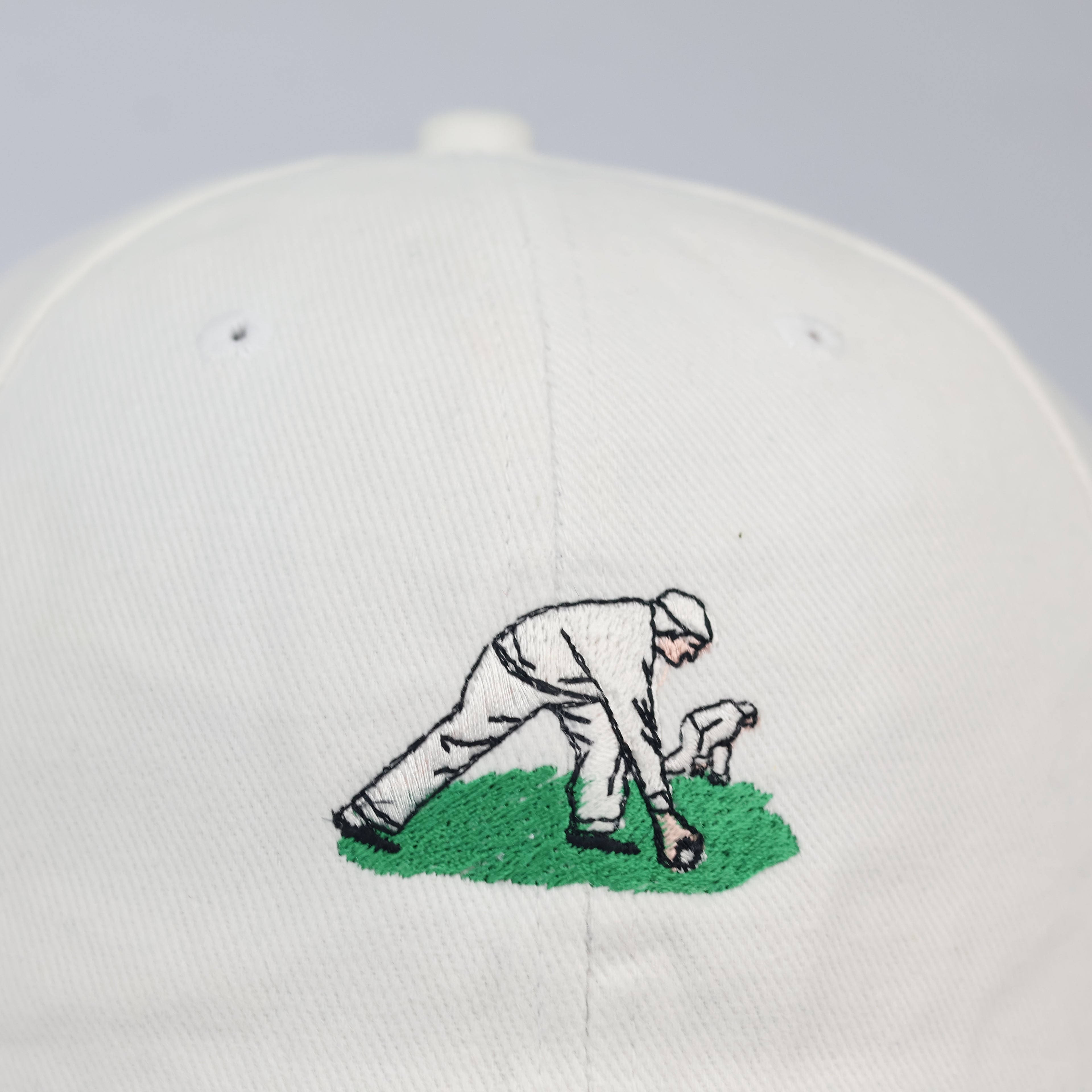 Minimalist Embroidered Golfer Scene Cream Baseball Cap