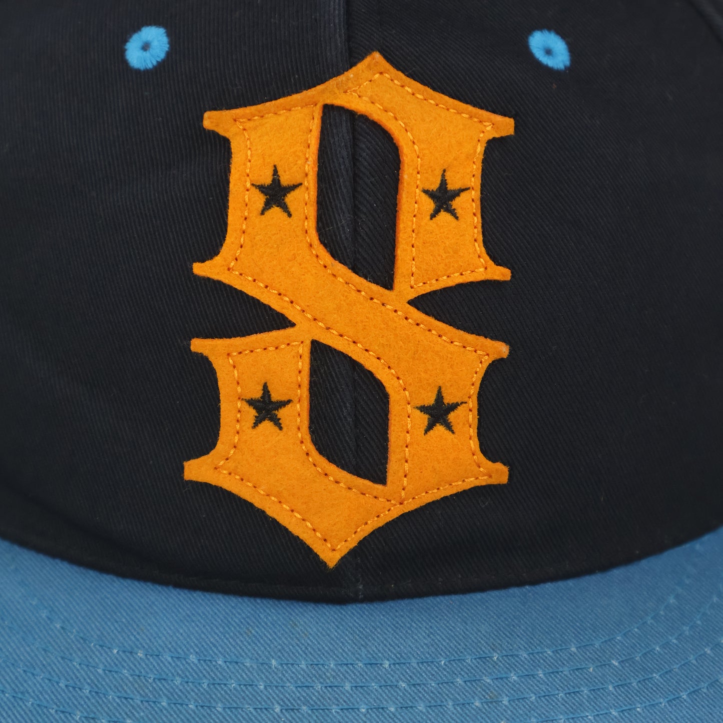 "S" Logo Star Snapback Cap - Black/Blue/Orange