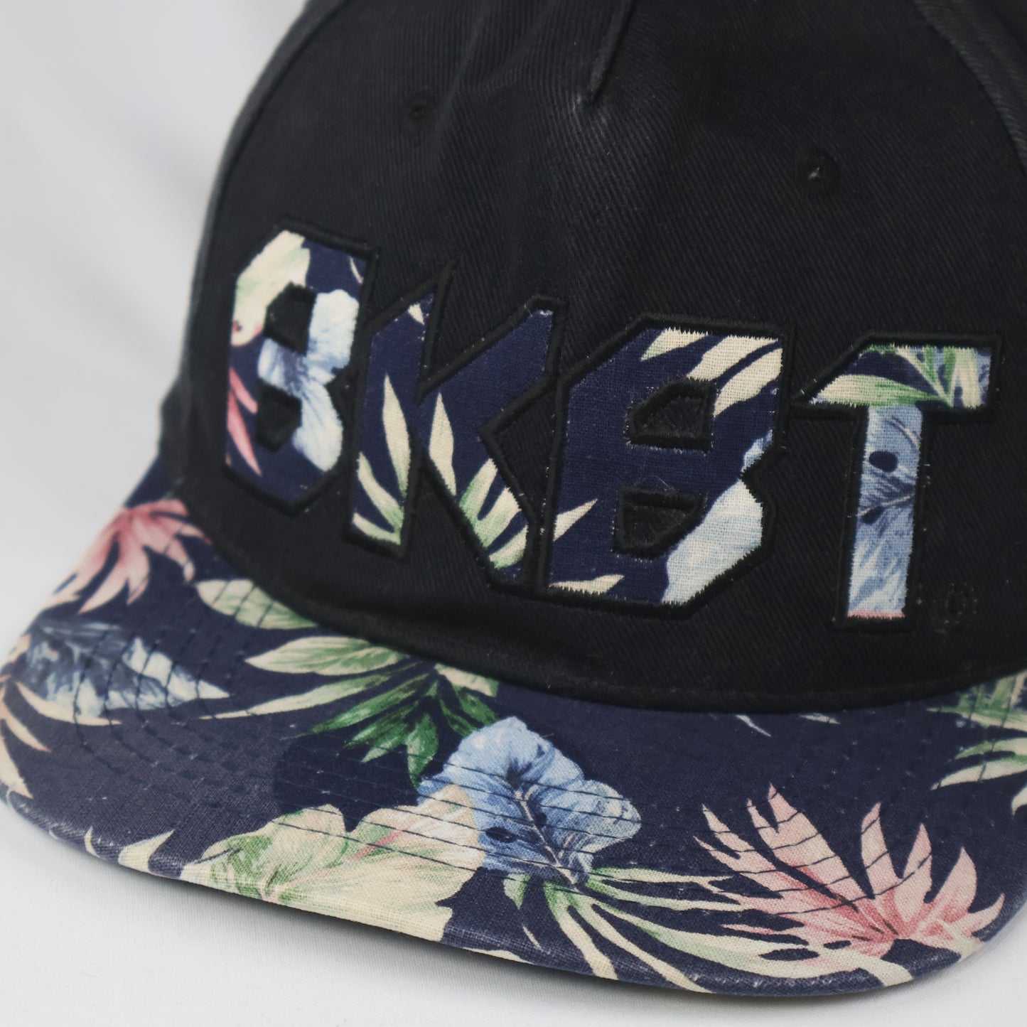 "BKBT" Floral Print Snapback Cap - Black