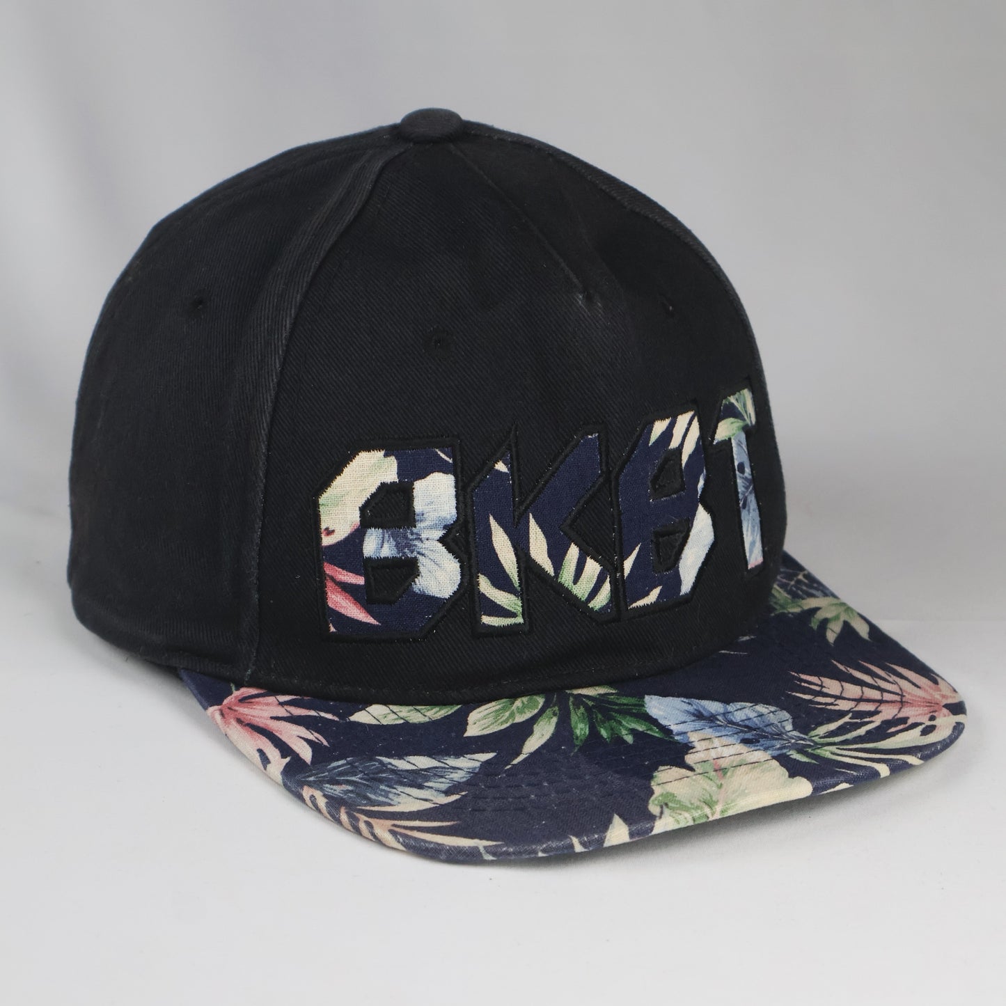 "BKBT" Floral Print Snapback Cap - Black