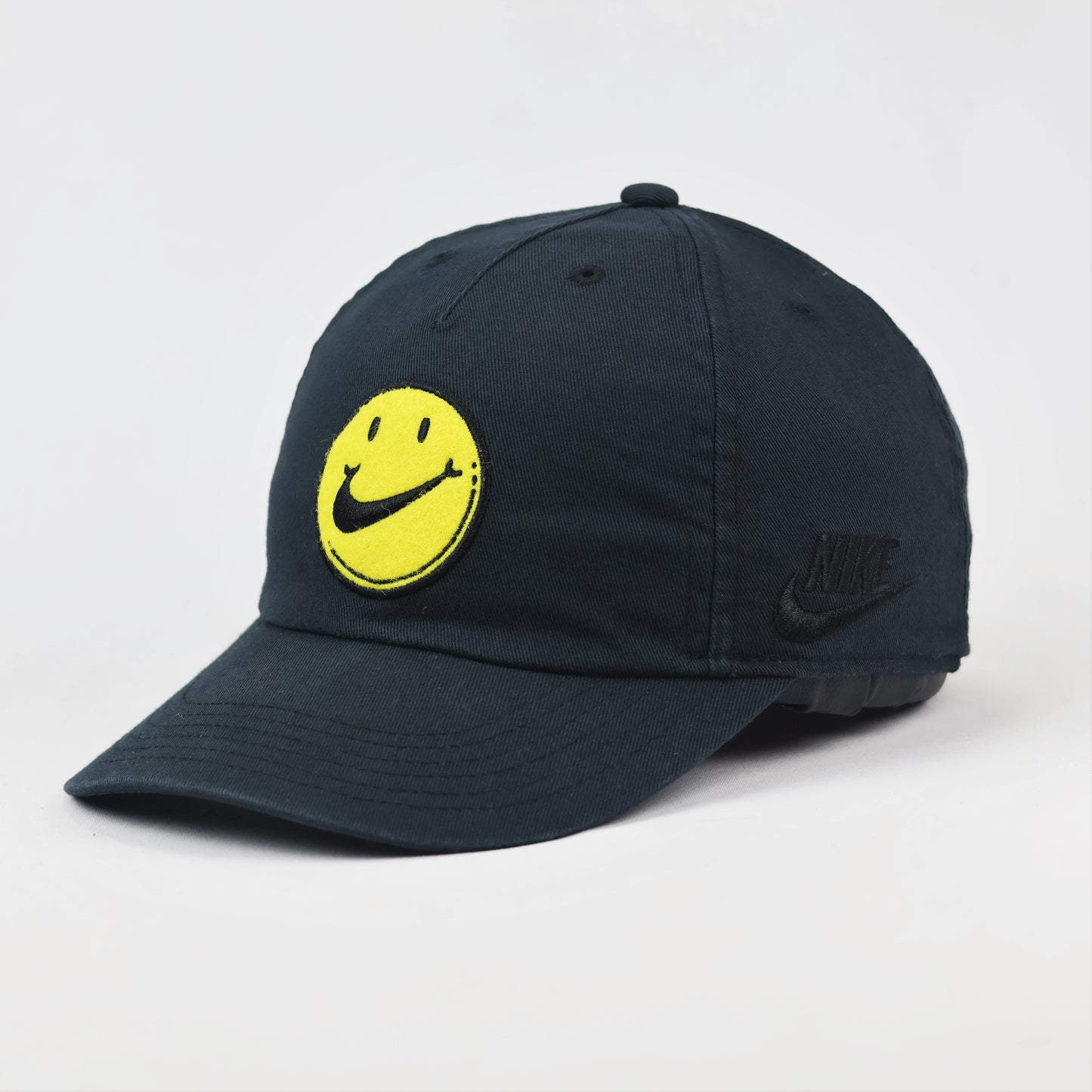 Nike Heritage86 Graphic Thrifted Cap - Black with Yellow Smiley Face Logo