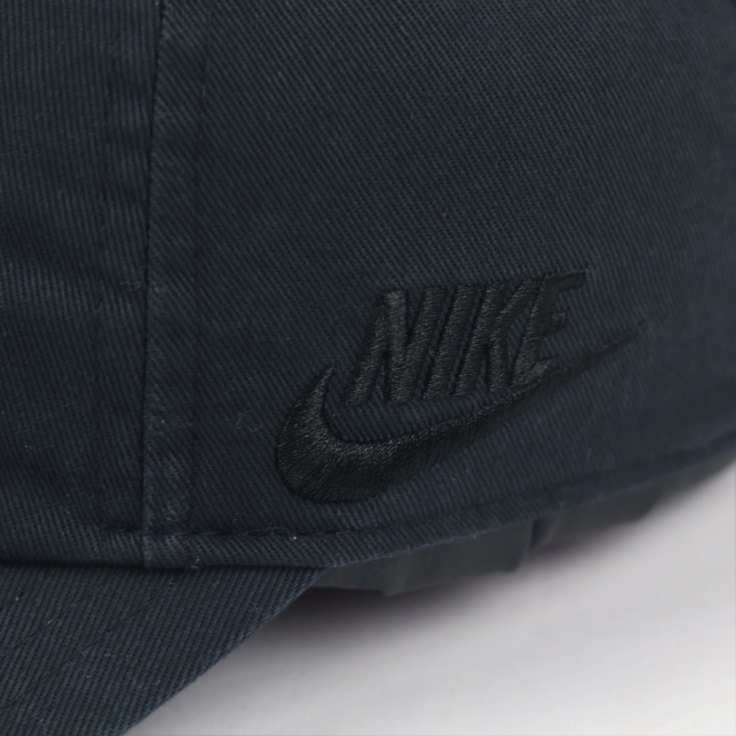 Nike Heritage86 Graphic Thrifted Cap - Black with Yellow Smiley Face Logo