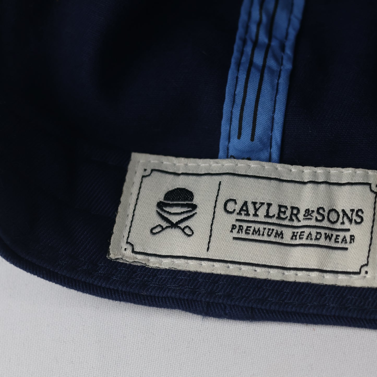 Cayler & Sons "Hello Brooklyn" Thrifted Snapback – Navy with Flamingo Print Brim