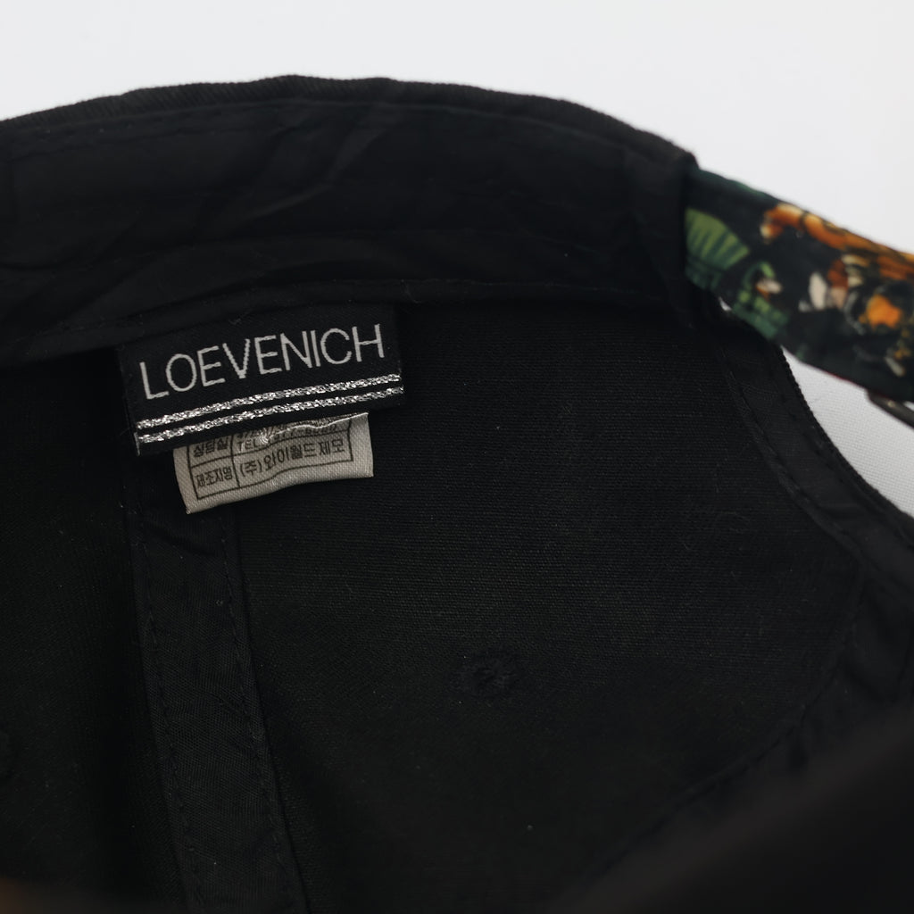 Loevenich Street Style "GUAVA" Thrifted Hat – Black Cap with Pierced Brim Detail